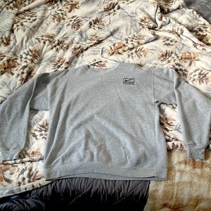 THE NIKE-STUSSY CREWNECK WORN A COUPLE TIMES BUT OUTGREW IT.